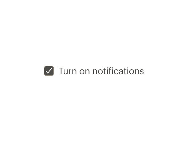 A checkbox label with the positive phrase turn on notifications.