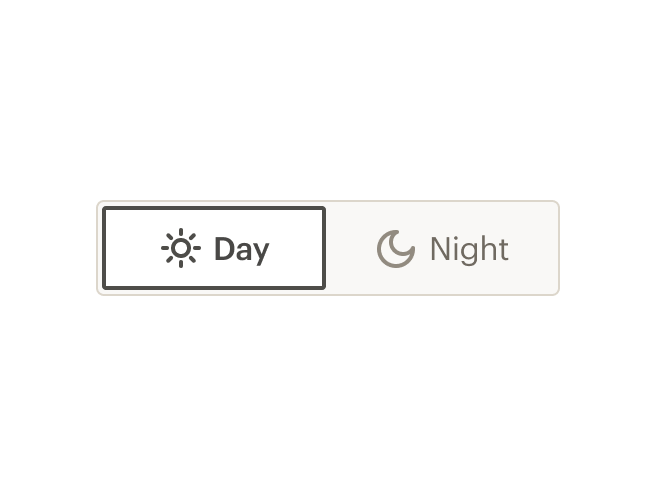 A toggle button with two segments labeled day and night.